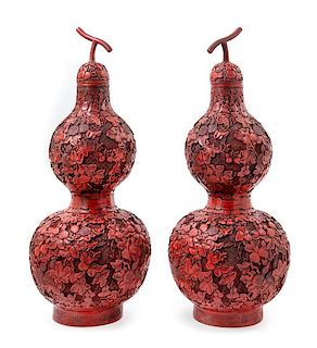 A Pair of Chinese Cinnabar Covered Vases Height 24 1/4 inches.