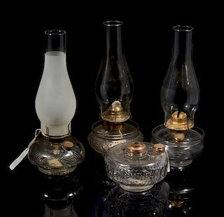 Four Clear Glass Oil Lamps
