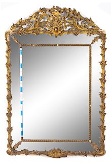 A George III Giltwood Mirror Height 58 1/2 x width 39 1/2 inches.