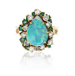 * An 18 Karat Yellow Gold, Opal Doublet, Diamond, and Emerald Ring, La Triomphe, 7.60 dwts.