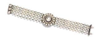 * A Vintage 14 Karat White Gold, Cultured Pearl and Diamond Surprise Watch, Lucien Piccard, 29.80 dwts.
