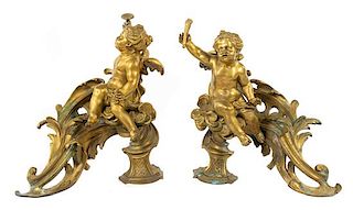 A Pair of Louis XV Style Gilt Bronze Chenets Height 14 x width 15 inches.