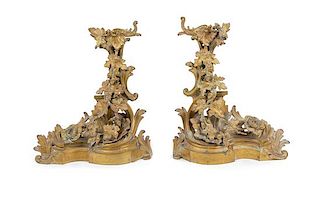 A Pair of Louis XV Style Gilt Metal Chenets Height 20 inches.