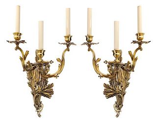 A Pair of Louis XV Style Gilt Bronze Three-Light Sconces Height overall 22 1/2 inches.