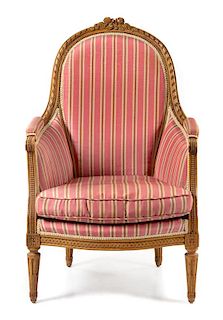 * A Louis XVI Style Fruitwood Bergere Height 41 inches.