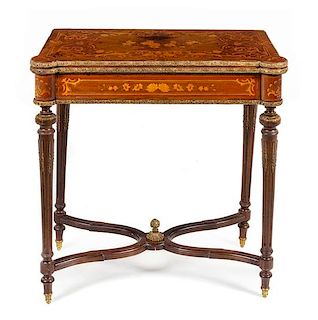 * A Louis XVI Style Marquetry Flip-Top Table Height 30 1/4 x width 29 x depth 16 1/2 inches.