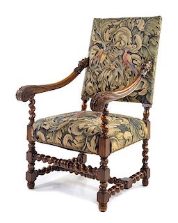 A French Renaissance Style Open Armchair Height 45 1/2 x width 24 x depth 34 inches.