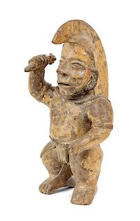 A Pre-Columbian Style Pottery Figure of a Warrior Height 18 1/2 inches.