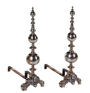A Pair of Baroque Style Pewter Andirons Height 35 x depth 24 1/2 inches.
