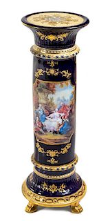A German Porcelain Pedestal Height 33 x diameter of top 10 7/8 inches.