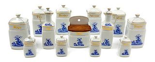 A German Porcelain Spice Set Height of oil decanter 9 5/8 inches.