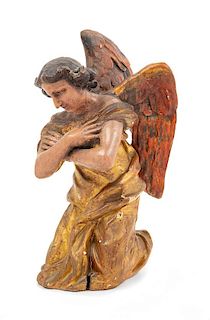 A Painted and Giltwood Figure of An Angel Height 17 inches.