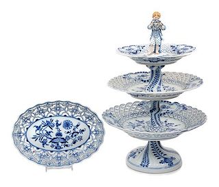 A Meissen Porcelain Stand and Basket Height of stand 16 1/2 inches; width of tray 9 3/8 inches.