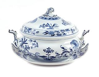 A Meissen Style Porcelain Tureen and Underplate Height 9 x width of underplate 13 inches.