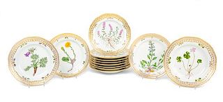 A Set of Twelve Royal Copenhagen Flora Danica Porcelain Salad Plates Diameter 8 7/8 inches.