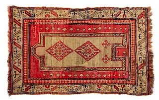 A Turkish Wool Rug 5 feet 4 inches x 3 feet 5 1/2 inches.