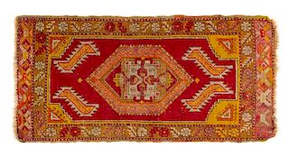 Two Turkish Wool Rugs Larger example: 3 feet 2 1/2 inches; smaller example: 3 feet 1 inch x 1 foot 6 1/2 inches.