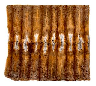 A Coyote Fur Throw 54 3/4 x 57 3/4 inches.