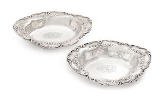 A Pair of American Silver Bowls, Redlich & Co., New York, NY, each of oval form, with C-scroll borders and repousse floral garla