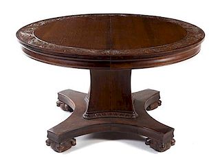 An American Oak Center Table Height 31 x diameter of top 53 1/2 inches (closed).