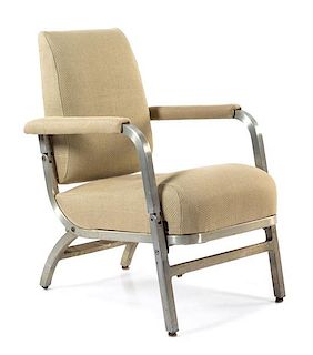 An Aluminum-Framed Folding Rail Car Lounge Chair Height 33 x width 20 1/2 x depth 21 inches.