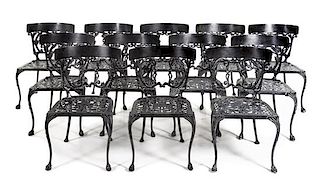 A Set of Twelve Painted Cast Iron Garden Chairs Height 30 inches.