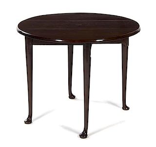 A George III Mahogany Drop-Leaf Table Height 28 1/4 x width 36 x depth 14 inches (closed).