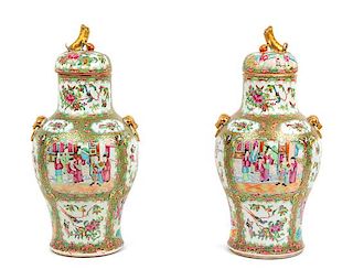 A Pair of Chinese Export Rose Medallion Porcelain Covered Vases Height 19 inches.