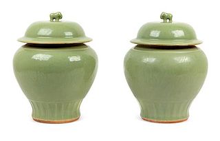 A Pair of Chinese Celadon Porcelain Covered Jars Height 14 1/2 inches.