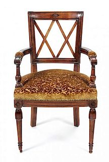 A French Provincial Style Carved Walnut Armchair Height 34 1/4 x width 20 1/2 x depth 16 inches.