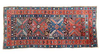 A Collection of Four Persian Rugs Largest 4 feet 5 inches x 8 feet 6 inches.