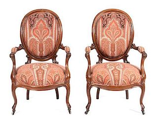 A Pair of Victorian Rosewood Upholstered Armchairs Height 39 5/8 inches.
