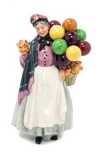 A Royal Doulton Figure Height 9 3/4 inches.