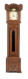 An English Mahogany and Pine Tall Case Clock Height 95 1/2 inches.