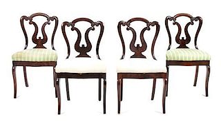 Four Mahogany Side Chairs Height 33 3/8 inches.