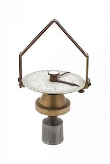 An American Brass Compass on Gimbal Height 13 1/2 inches.