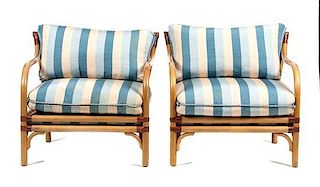 Four Rattan Armchairs Height 30 x width 34 inches.
