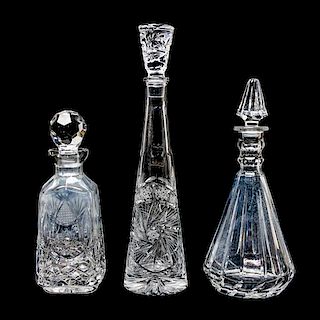 Three Pressed Glass Decanters Height of tallest 16 inches.