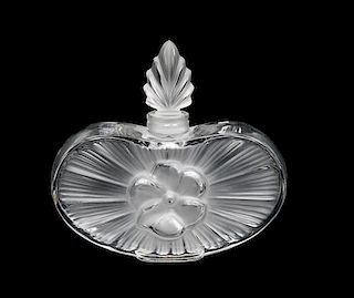 A Lalique Molded and Frosted Glass Perfume Bottle Height 5 inches.