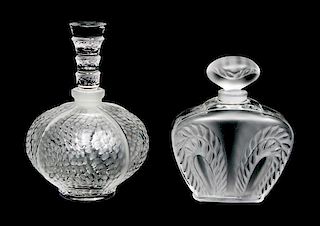 Two Lalique Molded and Frosted Glass Perfumes Height 4 inches.