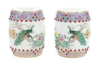 A Pair of Chinese Export Famille Rose Porcelain Garden Stools Height 17 3/4 inches.