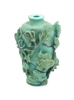 A Chinese Carved Turquoise Snuff Bottle Height 1 7/8 inches.