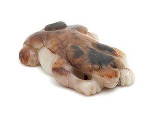 A Carved Jade Figure of a Recumbent Rabbit Length 2 5/8 inches.