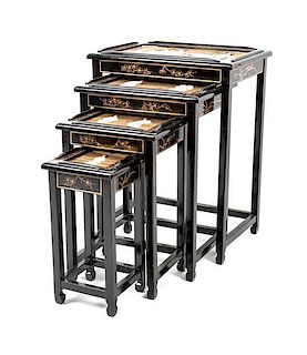 A Collection of Asian Style Black Lacquered Nesting Tables Height 25 1/5 x width 20 x depth 14 inches.