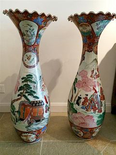 A Pair of Japanese Imari Porcelain Palace Urns Height 48 inches.