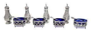 A Set of German Silver Classical Revival Open Salts and Pepper Shakers Height of tallest 4 5/8 inches.