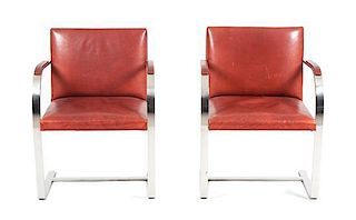 A Pair of Leather Upholstered and Chrome BRNO Style Armchairs Height 32 inches.
