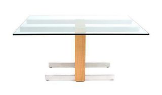 An Aluminium and Rosewood Glass Top Dining Table Height 29 1/4 x width (closed) 60 x depth 48 1/8 inches.