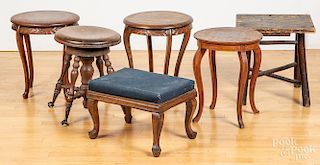 Seven assorted stools and small tables
