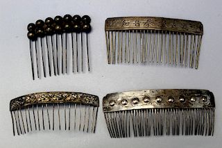 Four Chinese silver combs.
